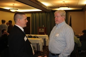 Reeves chats with a convention participant