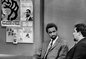 Kwame Somburu, left, with a student in New York in 1969.