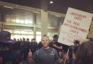 LYC co-founder Trent Somes at a Donald Trump rally, promoting the Libertarian Party 