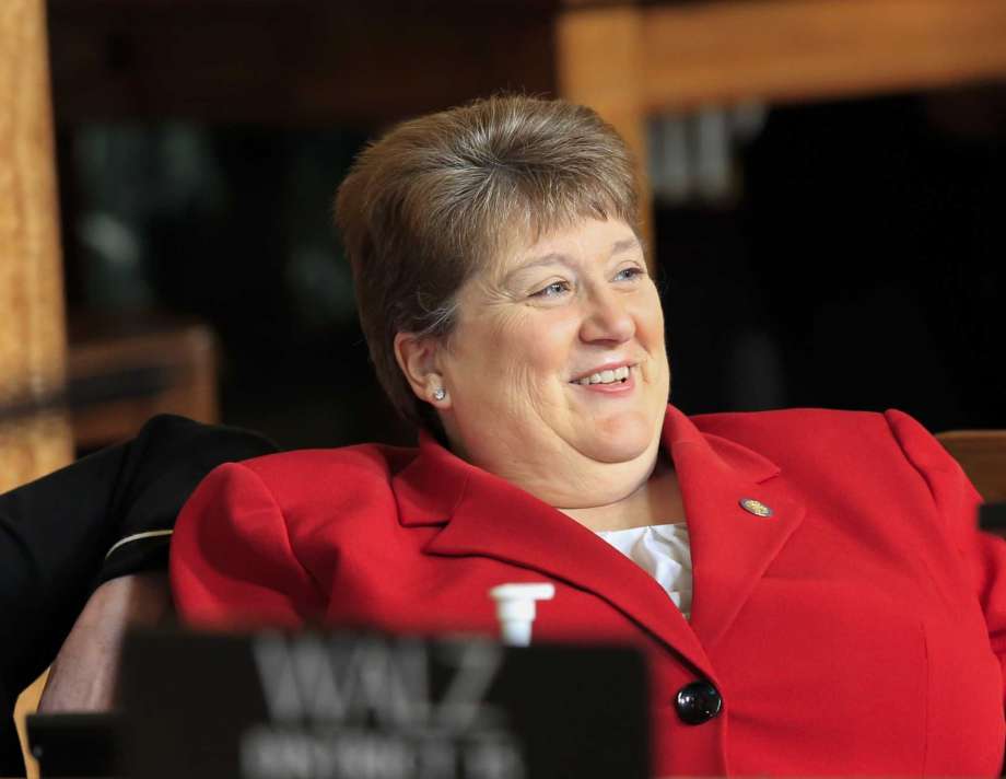 In this photo from March 13, 2018, Neb. state Sen. Laura Ebke of Crete follows debate on the budget, in Lincoln, Neb. Sen. Ebke left the Republican Party to become one of the nation's few Libertarian state legislators and is facing a political fight against two Republican challengers, including one backed by Gov. Pete Ricketts.